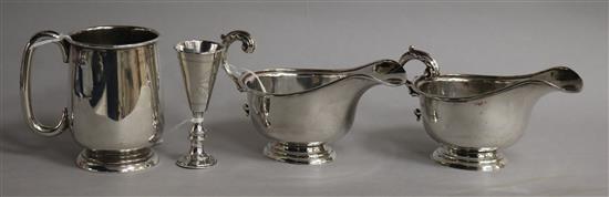 A silver Christening mug, Sheffield 1938, a pair of silver sauce boats and a kiddush cup, approx 12.6oz gross